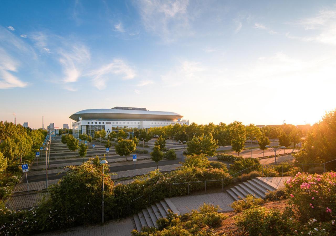 Hostel MHG Esterno foto The stadium at sunset