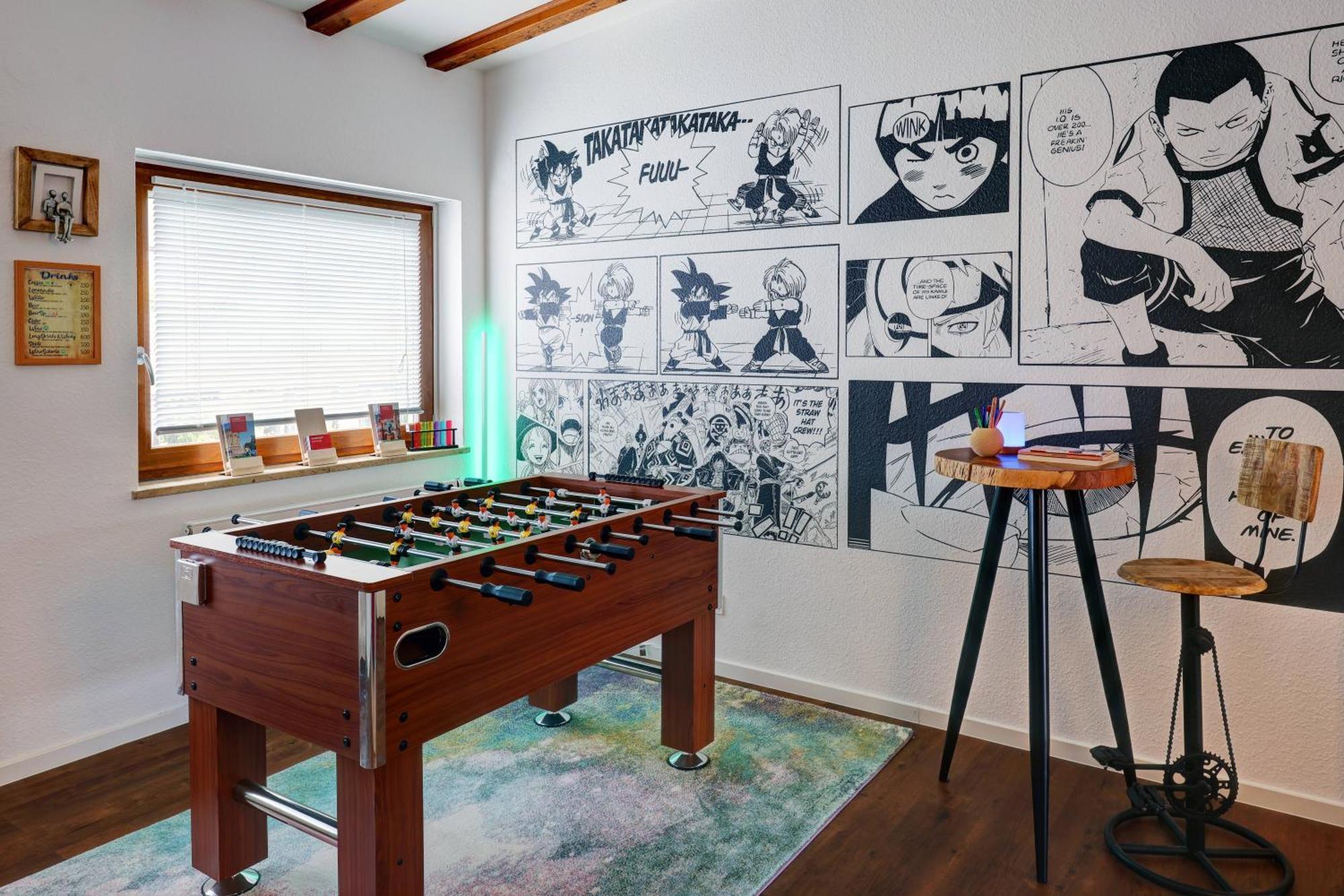 Hostel MHG Esterno foto A foosball table